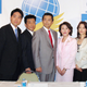 Happiness Realization Party candidates, including Jay Aeba (seen in the gray suit at center), at a Tokyo hotel in 2009.